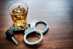 Alcohol, car keys and handcuffs - Felony DWI Defense 